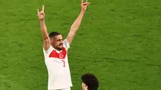 epa11453662 Merih Demiral of Turkey celebrates after scoring his second goal during the UEFA EURO 2024 Round of 16 soccer match between Austria and Turkey, in Leipzig, Germany, 02 July 2024. EPA/HANNIBAL HANSCHKE