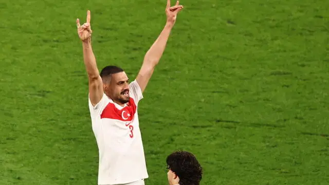 epa11453662 Merih Demiral of Turkey celebrates after scoring his second goal during the UEFA EURO 2024 Round of 16 soccer match between Austria and Turkey, in Leipzig, Germany, 02 July 2024. EPA/HANNIBAL HANSCHKE