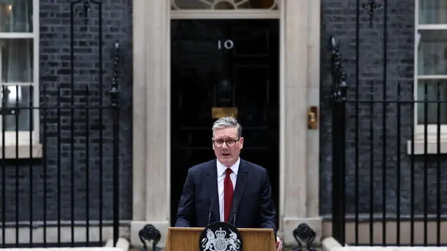 epa11458895 Britain's new Prime Minister Keir Starmer delivers his first speech outside 10 Downing Street in London, Britain, 05 July 2024. Labour party leader Keir Starmer became the country's new prime minister on 05 July, after his party won a landslide victory in the general election. EPA/ANDY RAIN