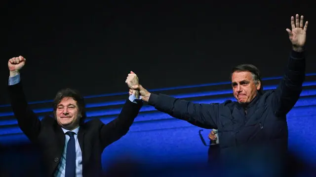 epa11466095 President of Argentina, Javier Milei (L), alongside former President of Brazil, Jair Bolsonaro (2019-2022), participates in the Conservative Political Action Conference (CPAC), in Balneario Camboriu, state of Santa Catarina, Brazil, 07 July 2024. Milei closed a meeting of ultra-right-wing movements in Latin America with a theoretical speech about the evils of socialism, without making any mention of Brazil's head of state, Luiz Inacio Lula da Silva. EPA/ANDRE BORGES