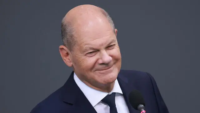 epa11454615 German Chancellor Olaf Scholz speaks during a Government question time at the German Parliament 'Bundestag' in Berlin, Germany, 03 July 2024. Chancellor Scholz attended the session of the German Parliament to answer questions of Members of Parliament. EPA/CLEMENS BILAN