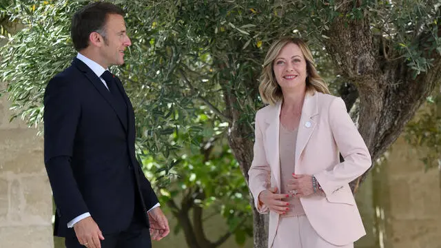 French President Emmanuel Macron (L) during the welcome ceremony with Italy's Prime Minister Giorgia Meloni (R), during the G7 Borgo Egnazia Summit in Borgo Egnazia (Brindisi), southern Italy, 13 June 2024. The G7 Borgo Egnazia Summit will be held from 13 to 15 June 2024. ANSA/ETTORE FERRARI