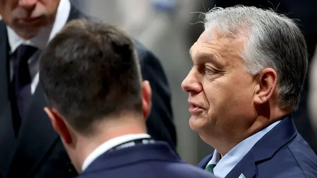 epa11470731 Hungaryâ€™s Prime Minister Viktor Orban (R) during the welcome ceremony for NATOâ€™s 2024 annual meeting in Washington, DC, USA, 10 July 2024. The 75th Anniversary NATO Summit is taking place in Washington, DC, from 09 to 11 July 2024 and NATO members are using the gathering as an opportunity to project their ongoing support for Ukraine as the country continues to fend off Russian aggression. EPA/TING SHEN / POOL