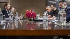 epa11414601 Ukrainian President Volodymyr Zelensky (2R) and Prime Minister of Denmark Mette Frederiksen (L) hold a bilateral meeting during the Summit on peace in Ukraine in Stansstad near Lucerne, Switzerland, 16 June 2024. International heads of state gather on 15 and 16 June at the Buergenstock Resort in central Switzerland for the two-day Summit on Peace in Ukraine. EPA/ALESSANDRO DELLA VALLE / POOL EDITORIAL USE ONLY