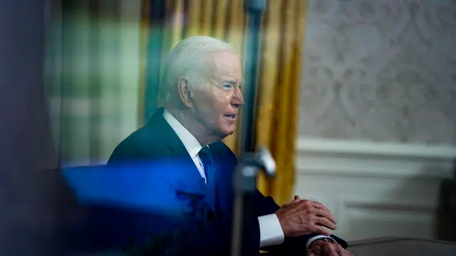 epa11479130 US President Joe Biden addresses the nation after former President Donald Trump was injured following a shooting at a July 13 election rally in Pennsylvania, in the Oval Office of the White House in Washington, DC, USA, 14 July 2024. Biden's address comes after Former US President Donald Trump was injured by a bullet in an assassination attempt on 13 July during a campaign rally. EPA/BONNIE CASH / POOL