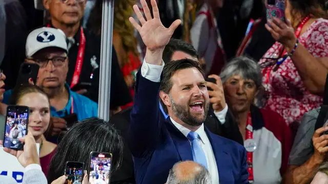 epa11480537 US Senator from Ohio JD Vance (C) is introduced as Vice Presidential nominee during the first session of the Republican National Convention (RNC) in the Fiserv Forum in Milwaukee, Wisconsin, USA, 15 July 2024. The convention comes just a few days after a 20-year-old Pennsylvania man attempted to assassinate former president and current Republic presidential nominee Donald Trump. EPA/SHAWN THEW