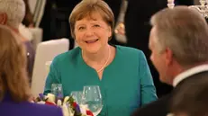 epa11372446 Former German Chancellor Angela Merkel attends a state banquet in honour of the French president at Schloss Bellevue palace in Berlin, Germany, 26 May 2024. The French president and the French first lady are on a three-day visit to Germany with stops in Berlin, Dresden, Moritzburg and Muenster. EPA/Sean Gallup / POOL