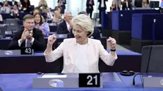 epa11485324 Ursula von der Leyen reacts after being re-elected as European Commission President during a plenary session of the European Parliament in Strasbourg, France, 18 July 2024. MEPs re-elected Von der Leyen as European Commission President for the next five years. EPA/RONALD WITTEK