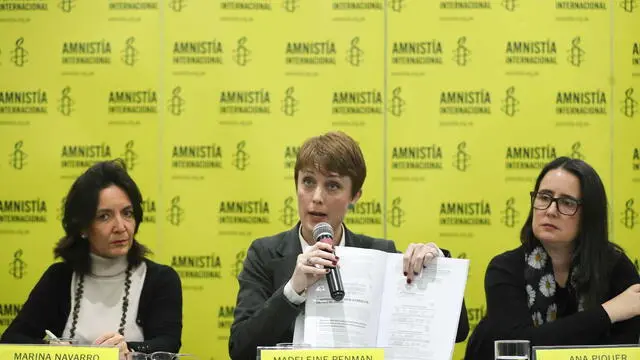 epa11486015 The South America researcher for Amnesty International (AI) Americas, Madeleine Penman (C); the executive director of AI Peru, Marina Navarro (L); and the director of AI Americas, Ana Piquer, presented the evidence obtained by AI in a report released in Lima, Peru, 18 July 2024. According to the evidence gathered by Amnesty International and detailed in the report, President of Peru, Dina Boluarte, may bear criminal responsibility for the deaths of protesters during the late 2022 and early 2023 protests. The report indicates that while it is suggested that the president could have changed tactics to prevent further fatalities, this did not occur. EPA/Paolo Aguilar