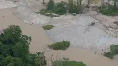 epa10461437 A handout picture provided on 11 February 2023 by the Indigenous People Ministry shows an aerial view over an illegal mining site in the Yanomami lands where the Moxihatetea community was identified, in the Amazonas near Roraima, Brazil, 10 February 2023. The Brazilian Task Force overflew the Yanomami lands and recognized an isolated community just 15 kilometers away from a site where illegal mining is practiced. EPA/LEO OTERO INDIGENOUS PEOPLE MINISTRY HANDOUT BEST QUALITY AVAILABLE HANDOUT EDITORIAL USE ONLY/NO SALES