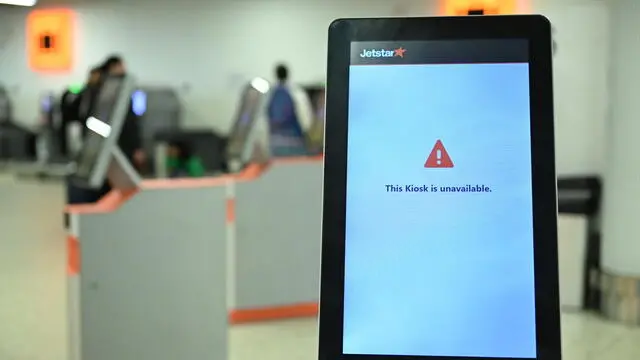 epa11488638 An unavailable self-service kiosk at the Jetstar domestic departures terminal at Melbourne Airport, Melbourne, Australia, 20 July 2024. Companies and institutions around the world have been affected on 19 July by a major computer outage in systems running Microsoft Windows linked to a faulty CrowdStrike cyber-security software update. According to CrowdStrike’s CEO, the issue has been identified, isolated and a fix has been deployed. EPA/JAMES ROSS AUSTRALIA AND NEW ZEALAND OUT