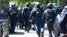 epa11489588 Police intervene during the second day of protests with a demonstration in the center of La Rochelle and march towards the port of La Pallice, in La Rochelle, France, 20 July 2024. According to the prefecture, around 3,500 people gathered in the coastal city to protest against controversial large-scale reservoir projects in the area. The protesters intended to march to the silos of the company Soufflet Negoce, which provides comprehensive product and logistics services from Europe and the Black Sea Basin for cereals. The company is situated at the agro-industrial terminal, which is considered to be the final point in the chain of the basin system. EPA/CAROLINE BLUMBERG