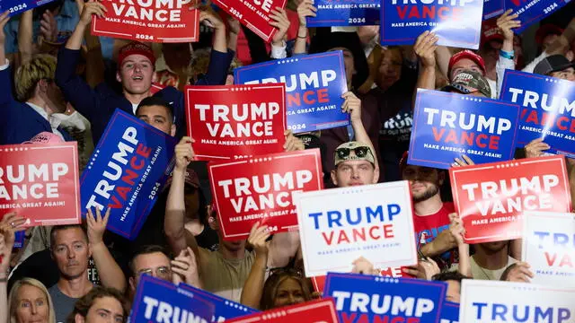 epa11489731 Supporters listen as Republican vice presidential nominee Senator JD Vance (not pictured) speaks at the first joint rally for Republican presidential nominee Donald J. Trump and himself at Van Andel Arena in Grand Rapids, Michigan, USA, 20 July 2024. EPA/ALLISON DINNER