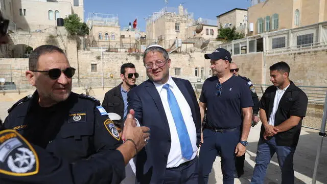 epa11299282 Israeli national security minister Itamar Ben Gvir (C) attends the 'Priestly Blessing' or Cohanim prayer in Hebrew on the holiday of Passover, in front of the Western Wall, in Jerusalem, 25 April 2024. The prayer, which is performed twice a year, is only spoken by the Cohanim, the high priests of the ancient temples during the week-long Jewish holiday of Passover, commemorating the Jewish exodus from Egypt in Biblical times. EPA/ABIR SULTAN