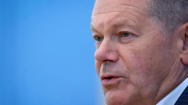 epa11493919 German Chancellor Olaf Scholz talks about domestic and foreign policy issues during the annual summer press conference in Berlin, Germany, 24 July 2024. EPA/HANNIBAL HANSCHKE