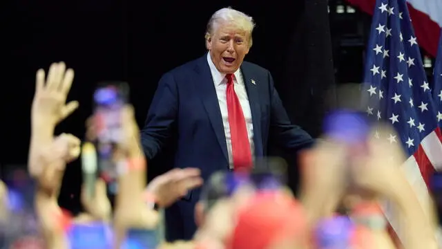 epa11489801 Republican presidential nominee Donald J. Trump arrives to his first joint rally with Republican vice presidential nominee Senator JD Vance at Van Andel Arena in Grand Rapids, Michigan, USA, 20 July 2024. EPA/ALLISON DINNER