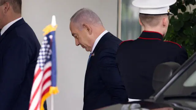 epa11496022 Israeli Prime Minister Benjamin Netanyahu (C) arrives outside the West Wing of the White House in Washington, DC, USA, 25 July 2024. US President Joe Biden hosts Israeli Prime Minister Netanyahu the day after Netanyahu delivered an address to a joint meeting of the US Congress. EPA/MICHAEL REYNOLDS