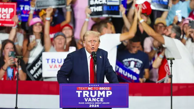 epa11495054 Republican presidential candidate Donald J. Trump speaks during a campaign rally at Bojangles Coliseum in Charlotte, North Carolina, USA, 24 July 2024. EPA/DAVID JENSEN