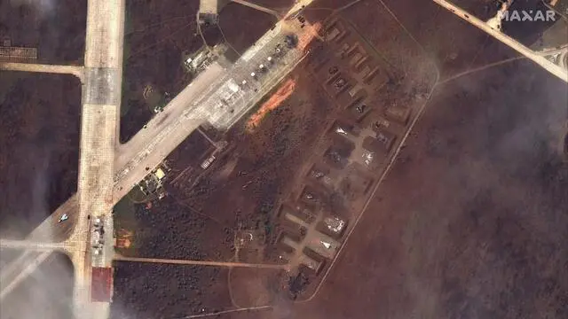 epa10115457 A handout satellite image made available by Maxar Technologies shows the aftermath of a reported attack on the Russian Saki airbase at Novofedorivka, Crimea, Ukraine, 10 August 2022 (issued 11 August 2022). Russia said that the explosions that happened on 09 August were accidental and no aircraft was damaged, whereas Ukraine said that Russia lost nine combat aircraft at the airbase in Crimea. EPA/MAXAR TECHNOLOGIES HANDOUT -- MANDATORY CREDIT: SATELLITE IMAGE 2022 MAXAR TECHNOLOGIES -- THE WATERMARK MAY NOT BE REMOVED/CROPPED -- HANDOUT EDITORIAL USE ONLY/NO SALES