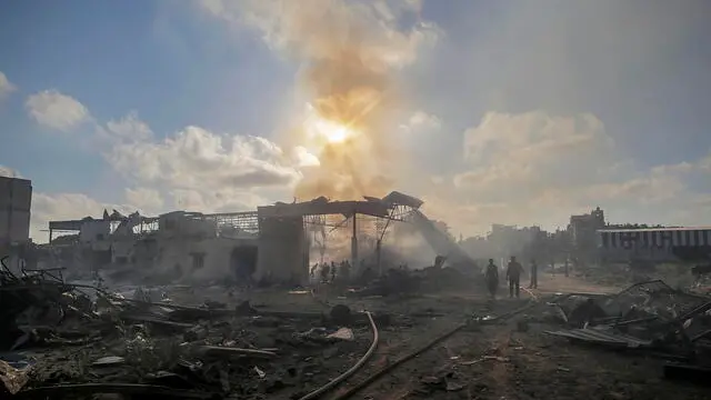 epa11488466 Palestinians inspect the rubble of a destroyed building following an Israeli air strike in the Al-Zawaida neighborhood, central Gaza Strip, 19 July 2024. More than 38,000 Palestinians and over 1,400 Israelis have been killed, according to the Palestinian Health Ministry and the Israel Defense Forces (IDF), since Hamas militants launched an attack against Israel from the Gaza Strip on 07 October 2023, and the Israeli operations in Gaza and the West Bank which followed it. EPA/MOHAMMED SABER