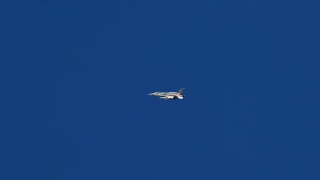 epa11060446 An Israeli fighter jet flies over an area near the Lebanon-Israel border, as seen from northern Israel, 06 January 2024. The Israeli military stated that the Israeli Air Force (IAF) struck terrorist targets in southern Lebanon following the sirens that sounded in northern Israel. Approximately 40 launches from Lebanon toward the area of Meron, in northern Israel, were identified. Tensions remain high in the region following the killing of senior Hamas leader Saleh al-Arouri in Lebanon by drone attack on 02 January. EPA/ATEF SAFADI