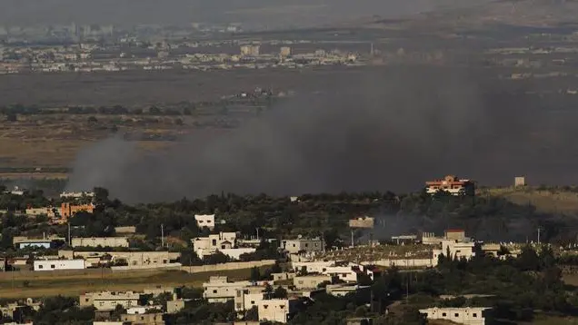 epa03727185 Smoke from shelling rises over the village of Jobata, on the Syrian side of the border with Israel, near the Israeli Druze village of Buqata in the Golan Heights, 01 June 2013 as a result of the fighting between the Syrian army loyal to President Bashar al-Assad and the armed opposition. Media reports state that Syrian government troops on 01 June 2013 intensified their attacks to recapture a major rebel-held town near the Lebanese border, said an opposition group, prompting pleas to save the trapped civilians. The Britain-based Syrian Observatory for Human Rights added that fierce clashes were under way between government troops, backed by fighters with Lebanese Shiite Hezbollah group, against the rebels on the outskirts of al-Kussair. EPA/ATEF SAFADI