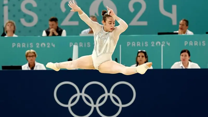 Angela Andreoli nell'esercizio al corpo libero - Foto Ansa © www.giornaledibrescia.it