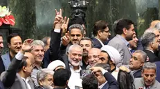 epa11510678 Hamas political leader Ismail Haniyeh (C) flashes victory sign as surrounded by Iranian lawmakers at the Iranian parliament in Tehran, Iran, 30 July 2024 (issued 31 July 2024). According to an Iranian Revolutionary Guard Corps (IRGC) statement on 31 July 2024, Haniyeh and one of his bodyguards were targeted and killed in Tehran on 31 July 2024. EPA/ABEDIN TAHERKENAREH