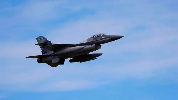 epa10973346 A Romanian military jet pilot flies his F16 Falcon during a demonstration following the opening ceremony for the European F-16 Training Center, held at the 86th Air Base 'Lieutenant Aviator Gheorghe Mociornita', in Borcea, Romania, 13 November 2023. The ETFC it is the first European dedicated training facility outside the United States territory that had all the means for training F16 pilots in order to facilitate the interoperability between NATO member countries. According to the project contract, Romanian Defense Ministry put the 86th Air Base at the training hub's disposal, including the tech training facilities and logistic support. The Netherlands already gave four pieces of F16 jet fighters for the training flights, and US company Lockheed Martin comes with the instructors and maintenance. At the EFTC are supposed to get the training the Ukrainian pilots that will handle the F16 that Ukraine will receive from its western allies, according to the NATO decision. EPA/Robert Ghement