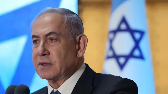 epa11481840 Israeli Prime Minister Benjamin Netanyahu addressing a memorial ceremony marking a decade for Israeli fallen soldiers of the 2014 Gaza War also known as Operation Protective Edge, in the Hall of Remembrance at the Mount Herzl Military Cemetery in Jerusalem, 16 July 2024. Israel’s Protective Edge military operation lasted 50 days in the Gaza Strip, 70 Israeli soldiers and five civilians were killed during the war according to the Israeli army spokesman. EPA/ABIR SULTAN / POOL