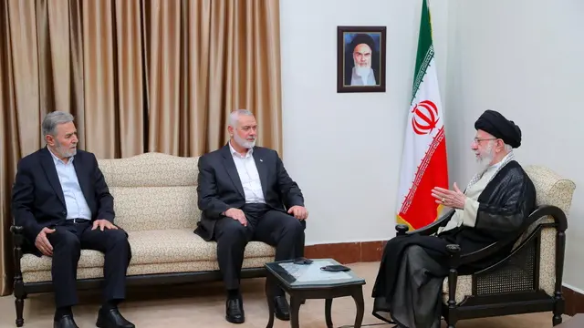 epa11507984 A handout picture made available by the Iranian Supreme Leader's office shows Iranian Supreme Leader Ayatollah Ali Khamenei (R) during a meeting with Hamas leader Ismael Haniyeh (C) and Palestine Jihad leader Ziyad al-Nakhalah (L) in Tehran, Iran, 30 July 2024. EPA/SUPREME LEADER OFFICE HANDOUT HANDOUT EDITORIAL USE ONLY/NO SALESHANDOUT EDITORIAL USE ONLY/NO SALES