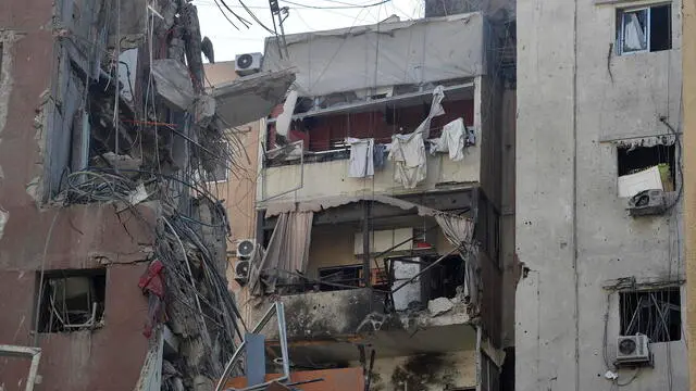 epa11510814 A building that was damaged in an Israeli strike the previous day in Beirut, Lebanon, 31 July 2024. Lebanon's state media said an Israeli drone targeted an area in the Haret Hreik neighborhood of Beirut. Israel Defense Forces (IDF) announced to have killed Hezbollah's senior military commander Fuad Shukr in a 'targeted strike' in Beirut on 30 July. EPA/WAEL HAMZEH