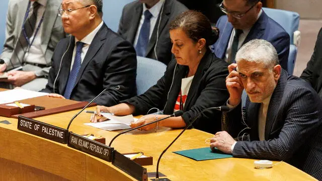 epa11513917 Ambassador to Iran Saeed Iravani (R) listens during a Security Council meeting at the United Nations Headquarters in New York, New York, USA, 31 July 2024. The president of the council called the meeting after Hamas said its political leader Ismail Haniyeh was killed by an Israeli strike on Iran's capital Tehran. EPA/SARAH YENESEL