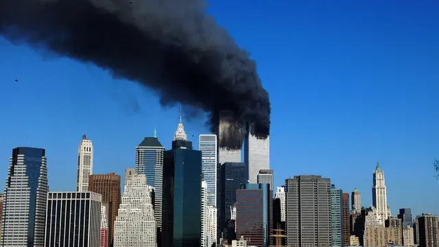 The twin towers of the World Trade Center billow smoke after hijacked airliners crashed into them early 11 September, 2001. The suspected terrorist attack has caused the collapsed of both towers. ANSA/Henny Ray ABRAMS- TO