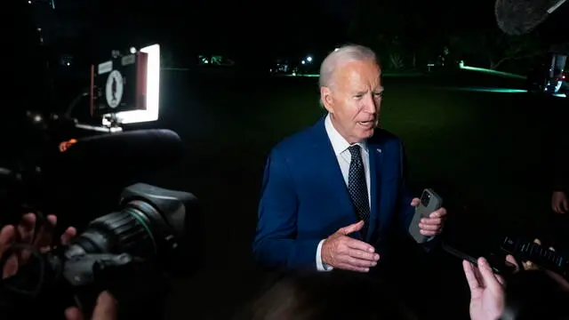 epa11507778 US President Joe Biden answers reporters' questions after landing in Marine One on the South Lawn of the White House in Washington, DC, USA, 30 July 2024. EPA/Ken Cedeno/Pool