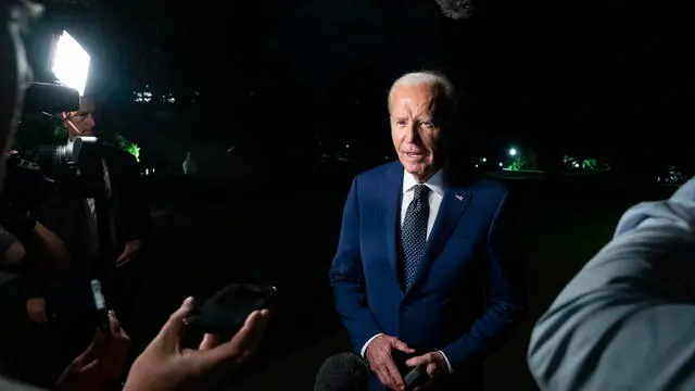 epa11507775 US President Joe Biden answers reporters' questions after landing in Marine One on the South Lawn of the White House in Washington, DC, USA, 30 July 2024. EPA/Ken Cedeno/Pool