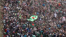 epa11528468 Bangladeshi people gather in Dhaka, Bangladesh, 05 August 2024. In an address to the nation, Chief of Army Staff General Waker-Uz-Zaman announced that Prime Minister Sheikh Hasina has resigned after weeks of unrest and an interim government will be formed to run the country. Dhaka authorities have imposed a new curfew starting 06:00 p.m. local time on 04 August. As casualties mounted and law enforcement struggled to contain the unrest, the Bangladeshi government on 20 July 2024 had imposed an initial nationwide curfew and deployed military forces after violence broke out in Dhaka and other regions following student-led protests demanding reforms to the government's job quota system. EPA/MONIRUL ALAM