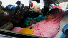 epa08321073 Bangladesh Nationalist Party (BNP) chairperson Begum Khaleda Zia sits inside a car after her release from Bangabandhu Sheikh Mujib Medical University in Dhaka, Bangladesh, 25 March 2020. Bangladesh government decided to release ailing Khaleda Zia for six months on humanitarian grounds on the condition of receiving treatment at home and not travelling abroad. Khaleda was serving a prison sentence of a total of 17 years in two graft cases. EPA/MONIRUL ALAM