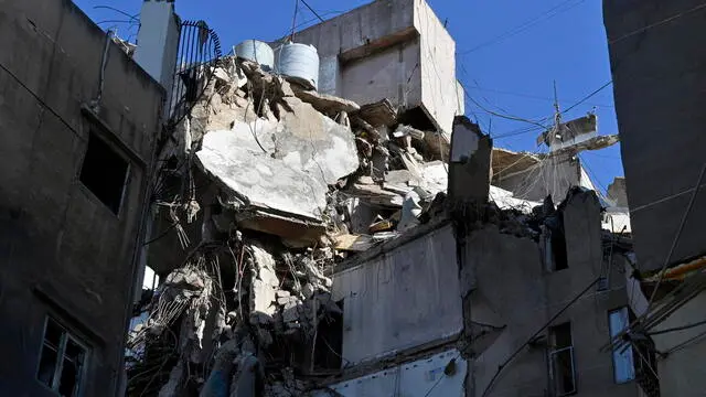 epaselect epa11510815 Buildings that were damaged in an Israeli strike the previous day in Beirut, Lebanon, 31 July 2024. Lebanon's state media said an Israeli drone targeted an area in the Haret Hreik neighborhood of Beirut. Israel Defense Forces (IDF) announced to have killed Hezbollah's senior military commander Fuad Shukr in a 'targeted strike' in Beirut on 30 July. EPA/WAEL HAMZEH