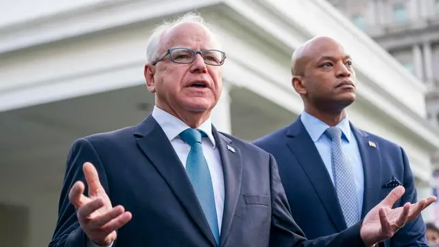 epa11456052 Minnesota Governor Tim Walz (L), with Maryland Governor Wes Moore (R), deliver remarks to the news media following their meeting with US President Joe Biden at the White House in Washington, DC, USA, 03 July 2024. President Biden is meeting with key Democratic allies as he tries to control the damage from his poor debate performance. EPA/SHAWN THEW