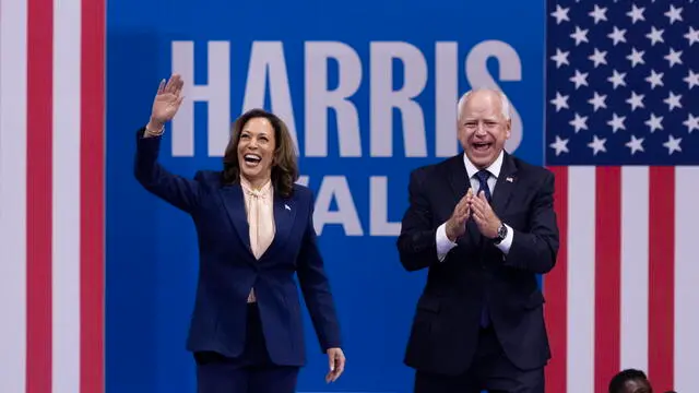 epa11532087 Democratic presidential candidate US Vice President Kamala Harris (L) enters with her new running mate Democratic vice presidential candidate Minnesota Governor Tim Walz (R) during a campaign rally at the Liacouras Center at Temple University in Philadelphia, Pennsylvania, USA, 06 August 2024. Earlier, Harris announced Walz as her running mate for the 2024 presidential election and this is their first campaign event together. EPA/MICHAEL REYNOLDS