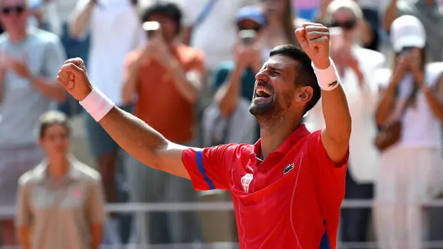 Novak Djokovic of Serbia cries as he celebrates after winning against Carlos Alcaraz of Spain in their Men Singles gold medal match of the Tennis competitions in the Paris 2024 Olympic Games, at the Roland Garros in Paris, France, 04 August 2024. ANSA/ETTORE FERRARI