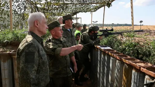 epa11497019 A handout photo made available by the Russian Defence Ministry Press-Service shows Russian Defense Minister Andrei Belousov (L) during an inspection of the organization of combat training of military personnel at a training ground of the Leningrad Military District in St. Petersburg, Russia, 26 July 2024. EPA/RUSSIAN DEFENCE MINISTRY PRESS SERVICE HANDOUT -- MANDATORY CREDIT -- HANDOUT EDITORIAL USE ONLY/NO SALES