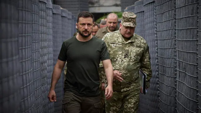 epa11509032 A handout made available by the Presidential Press Service shows Ukrainian President Volodymyr Zelensky (L) inspecting the construction of fortifications at an undisclosed location, during his working visit in the Volyn region, Ukraine, 30 July 2024 amid the Russian invasion of Ukraine. EPA/PRESIDENTIAL PRESS SERVICE HANDOUT HANDOUT EDITORIAL USE ONLY/NO SALES