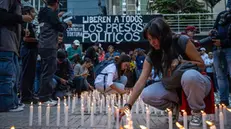 epaselect epa11538489 People attend a national vigil for political prisoners called by the opposition, at Los Palos Grandes square, in Caracas,Venezuela, 08 August 2024. According to a report by EFE, Venezuelan President Nicolas Maduro announced during a march on 03 August, that 2000 protesters were arrested. The opposition have been protesting against the official results of Venezuela's 28 July presidential elections and called on the international community to recognize opposition candidate Edmundo Gonzalez as the election winner. The Venezuelan National Electoral Council (CNE) on 02 August 2024 proclaimed Nicolas Maduro as re-elected president of Venezuela. EPA/Henry Chirinos