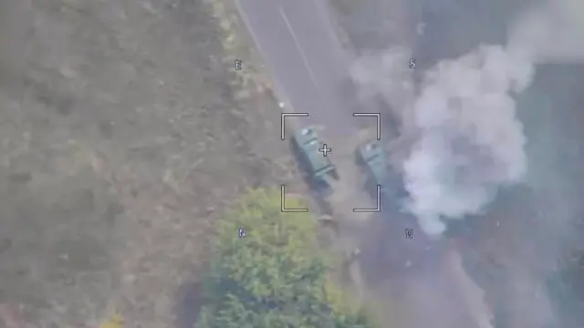 epa11546539 A still image taken from a handout video provided by the Russian Defence Ministry shows a Lancet drone striking a mobile missile launcher of the Ukrainian Armed Forces at the border area in the Kursk region, Russia, 12 August 2024. According to Andrei Belostotsky, acting deputy governor of the Kursk region, over 3,000 civilians were evacuated from border areas as a result of attacks by the Ukrainian Armed Forces in the Kursk region that started on 06 August. On 10 August the National Anti-Terrorism Committee confirmed the enforcement of a counter-terrorism operation (CTO) in the Kursk, Belgorod and Bryansk regions. EPA/RUSSIAN DEFENCE MINISTRY PRESS SERVICE/HANDOUT HANDOUT EDITORIAL USE ONLY/NO SALESHANDOUT EDITORIAL USE ONLY/NO SALES