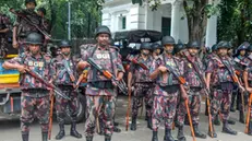 epa11512250 Border Guard Bangladesh (BGB) members stand guard during a 'March for Justice' in front of the Supreme Court area in Dhaka, Bangladesh, 31 July 2024. A nationwide 'March for Justice' was called on 31 July by the Students Against Discrimination group, which has led the quota reform protests, in courts, campuses and on the streets to protest against the 'killings, attacks, and enforced disappearances', and to demand an investigation by the United Nations into the violence that occurred during the student-led protests against the government's job quota system, according to the group's coordinator. EPA/MONIRUL ALAM