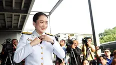 epa11553715 Thailand's newly elected Prime Minister Paetongtarn Shinawatra adjusts her dress upon her arrival to receive the royal command appointment to become prime minister, at the Pheu Thai Party's headquarters in Bangkok, Thailand, 18 August 2024. The ruling Pheu Thai Party leader Paetongtarn Shinawatra, the youngest daughter of the coup-ousted former premier Thaksin Shinawatra, succeeded in the parliamentary vote to become Thailand's 31st prime minister and the country's youngest prime minister in history. EPA/RUNGROJ YONGRIT