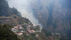 epa11554213 General view of a fire in Madeira Island, Portugal, 18 August 2024. The fire, which started on 14 August in the municipality of Ribeira Brava and spread the following day to the neighboring municipality of Camara de Lobos, is now active on three fronts and is being fought by 120 operational, 43 vehicles and one aircraft, with the region having the support of 76 members of the joint force of the National Emergency and Civil Protection Authority. EPA/HOMEM DE GOUVEIA