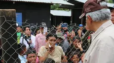 epa11443806 Elected president of Panama, Jose Raul Mulino (R), visits the Lajas Blancas migrant shelter in Darien, Panama, 28 June 2024. Mulino said that he aspires to sign with the United States, within the framework of his assumption of office on 01 July 2024, an agreement for the repatriation of irregular migrants who arrive in the Central American country through the dangerous Darien jungle, the natural border with Colombia. EPA/Moncho Torres